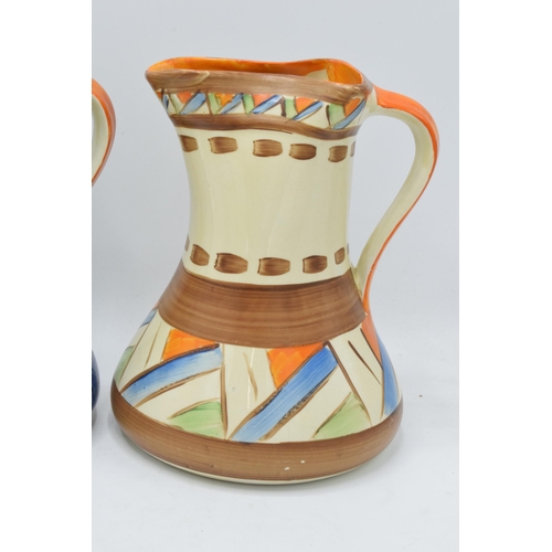 86 - A collection of Myott Son and Co Art Deco jugs depicting various designs (3). 19cm tall. Generally i... 