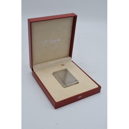 234A - A boxed silver plated ST Dupont lighter