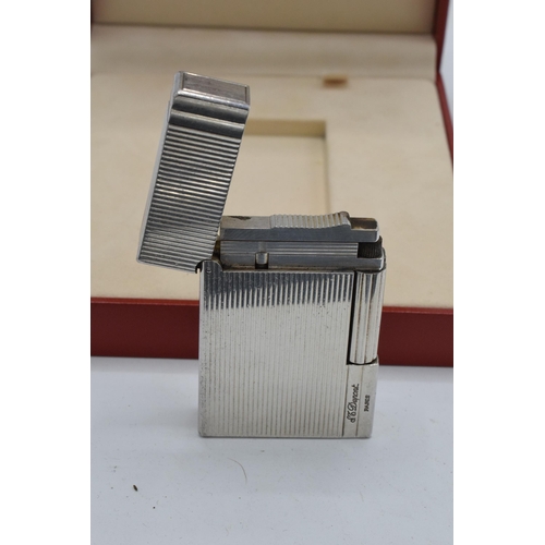 234A - A boxed silver plated ST Dupont lighter