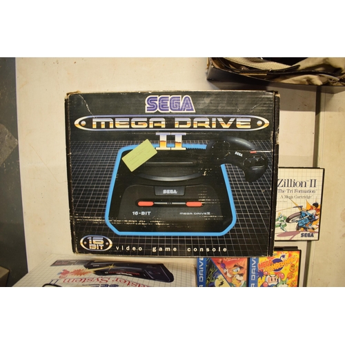 234B - A collection of Sega items to include Sega Master System II, Mega Drive II and games to include Zill... 