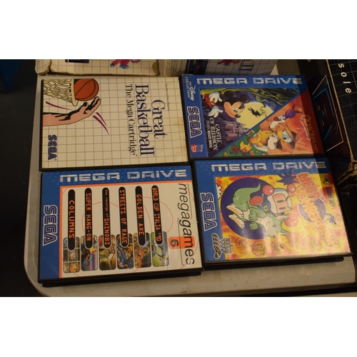 234B - A collection of Sega items to include Sega Master System II, Mega Drive II and games to include Zill... 