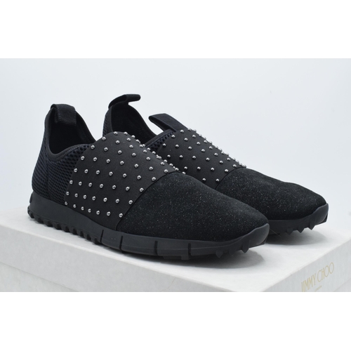 235A - A pair of men's Jimmy Choo 'Oakland' slip-on fabric sneakers, with a ridged rubber sole and glittere... 