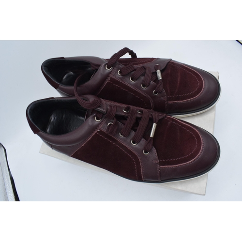 235B - A pair of Jimmy Choo Miami burgundy suede and patent leather men's trainers, with a think sole, leat... 