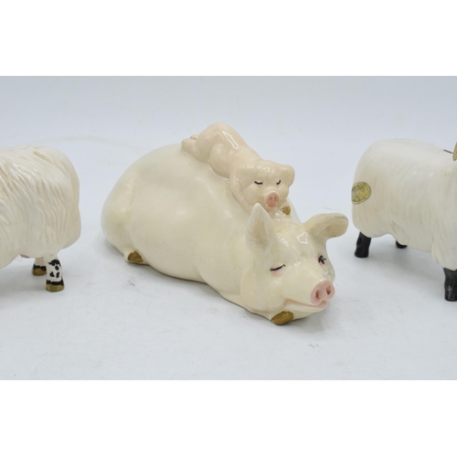 160E - Beswick sheep to include Black Faced Sheep 1765, Black Faced Ram and Pig and Piglet 2746 (3). In goo... 