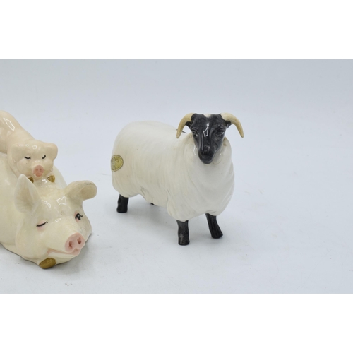 160E - Beswick sheep to include Black Faced Sheep 1765, Black Faced Ram and Pig and Piglet 2746 (3). In goo... 