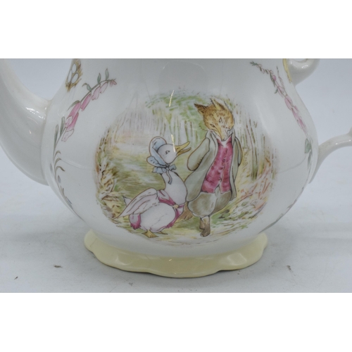 71A - Royal Albert teapot The World of Beatrix Potter. 16cm tall. In good condition with no obvious damage... 