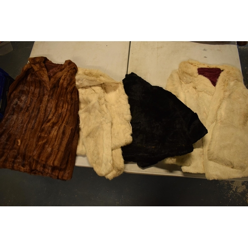 277 - A large collection of fur coats of varying lengths and similar items by various makers such as Solom... 