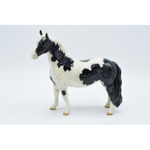 152 - Beswick piebald pinto pony 1373. In good condition with no obvious damage or restoration. Heavily cr... 