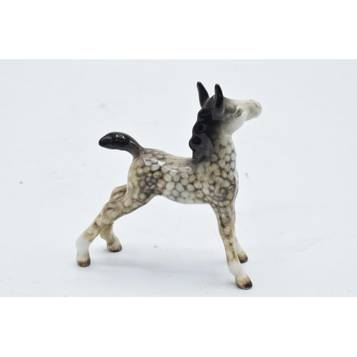 154 - Beswick small rocking horse grey outstretched foal 763. In good condition with no obvious damage or ... 