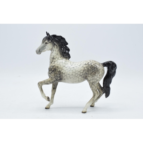 155 - Beswick rocking horse grey prancing Arab horse 1261. 17cm tall. In good condition with no obvious da... 