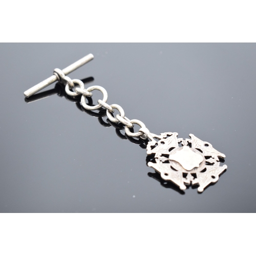 182 - A hallmarked silver chain and fob with T-bar. 15.0 grams. 9cm long.