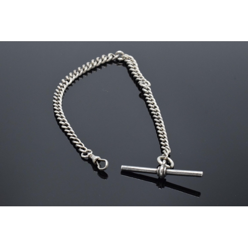 183 - A hallmarked silver Albert watch chain with T bar. 27.4 grams. Hallmark to each link. 32cm long.