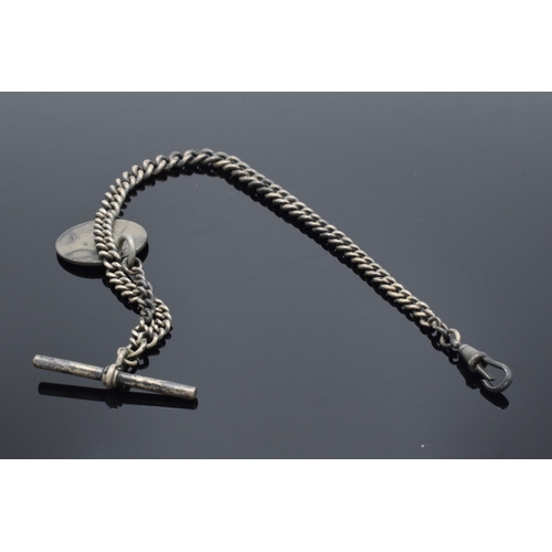 185A - Silver Albert watch chain with T bar, clip and coin fob. 40.6 grams. 36cm long.