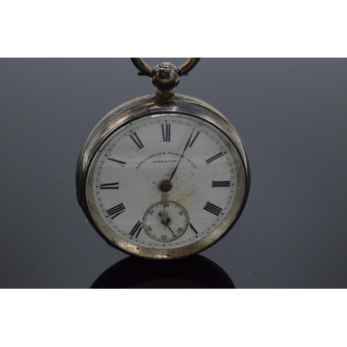 189 - Silver pocket watch with a key. Lancashire Watch Co Ltd. Prescot. Chester 1893.