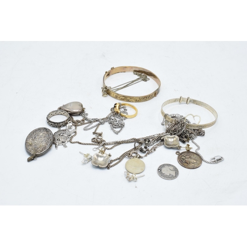 203Q - A collection of silver and silver coloured jewellery to include 9ct on silver items, bangles, chains... 