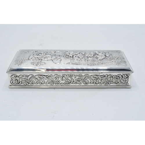 217 - Dutch silver cigarette box with repoussé decoration of a tavern scene. 18 x 8cm.