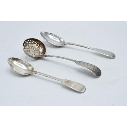 227 - A collection of silver to include a Victorian sifter spoon Edinburgh, a tea spoon and a dessert spoo... 