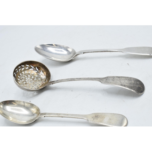 227 - A collection of silver to include a Victorian sifter spoon Edinburgh, a tea spoon and a dessert spoo... 