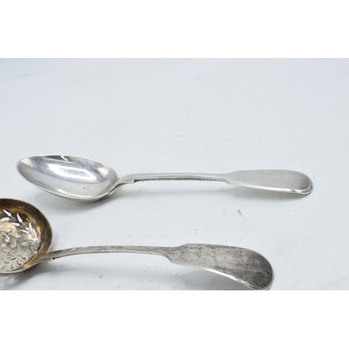 227 - A collection of silver to include a Victorian sifter spoon Edinburgh, a tea spoon and a dessert spoo... 