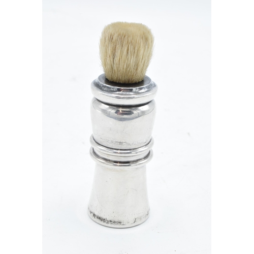 239 - Silver shaving brush. London 1927. 10.5cm tall.