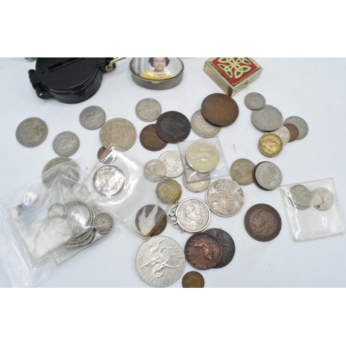 274 - A mixed collection of items to include coinage from around the world to include British pre 1946 coi... 