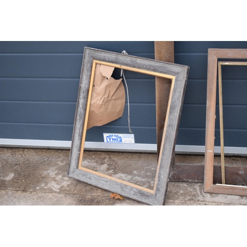 288 - A collection of various shaped oak and similar hardwood picture frames with the largest being 92 x 7... 