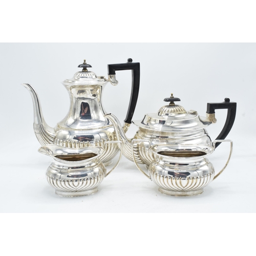 314 - Silver plated 4-piece tea set with ribbed decoration to include tea pot, coffee pot, milk and sugar ... 