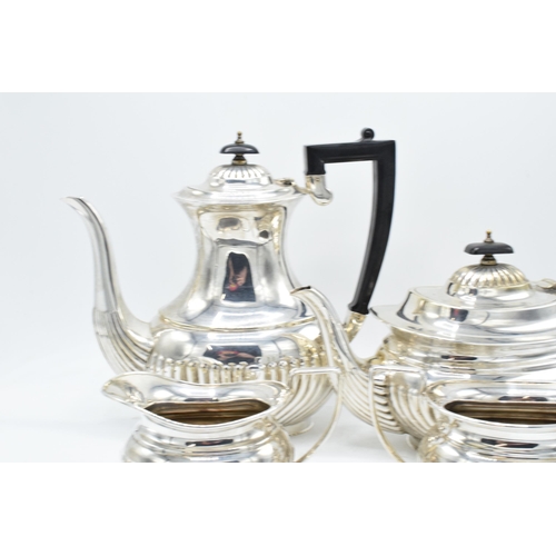 314 - Silver plated 4-piece tea set with ribbed decoration to include tea pot, coffee pot, milk and sugar ... 