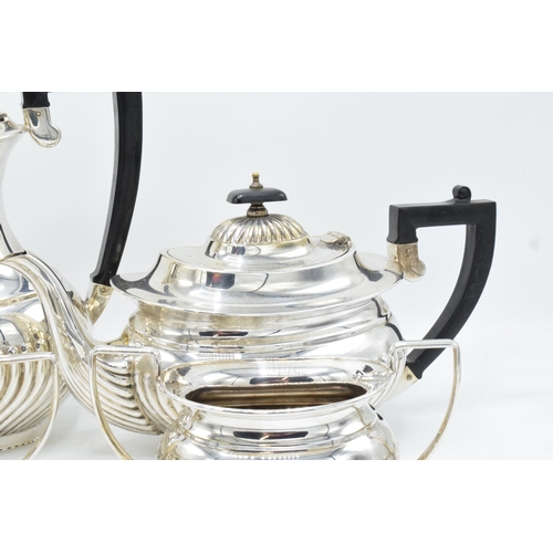 314 - Silver plated 4-piece tea set with ribbed decoration to include tea pot, coffee pot, milk and sugar ... 