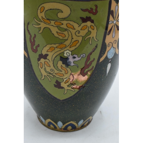 318 - A large cloisonné vase with scenes resembling cock fighting. 31cm tall. Generally in good condition ... 