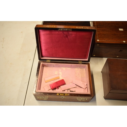 322 - A collection of 4 late 19th / early 20th century wooden jewellery boxes / caddies, some with Mother ... 