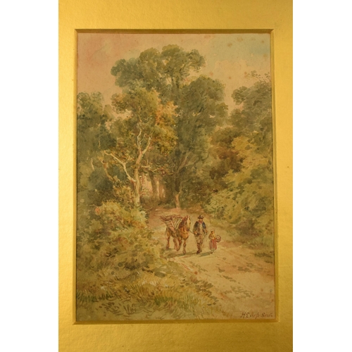 327 - A framed watercolour of a man walking his horse with a child through a woodland path. Signed by H Ea... 