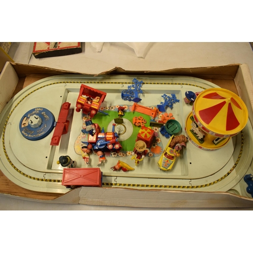 329 - Corgi Magic Roundabout Playground 853 with Merry Go Round and musical element with figures and decor... 