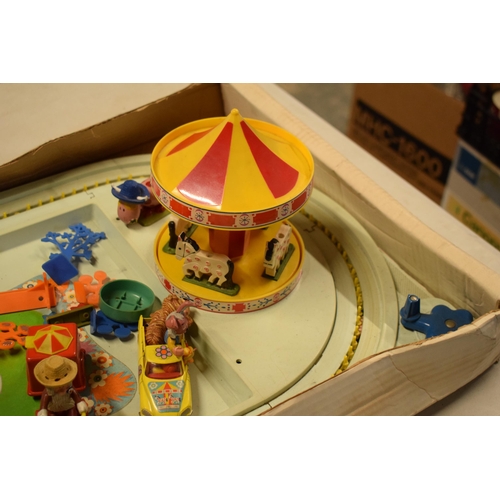 329 - Corgi Magic Roundabout Playground 853 with Merry Go Round and musical element with figures and decor... 