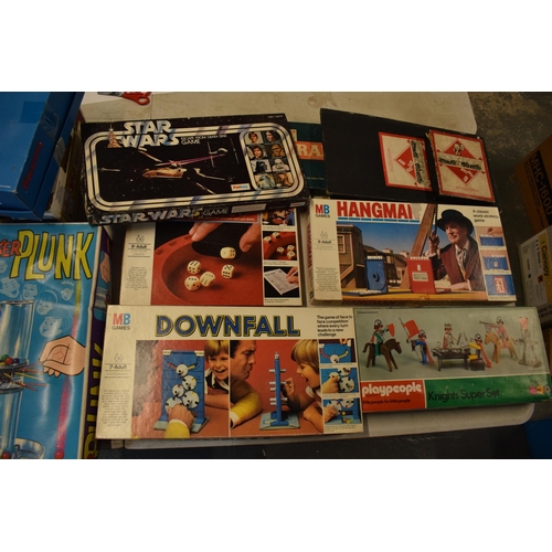 332 - A collection of vintage children's board games and similar to include Kerplunk, Downfall, Hangman, M... 