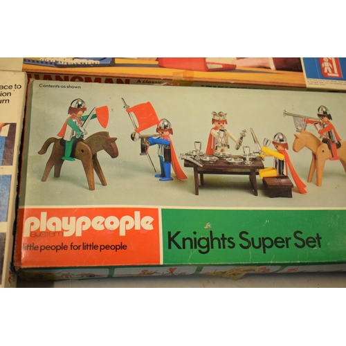 332 - A collection of vintage children's board games and similar to include Kerplunk, Downfall, Hangman, M... 