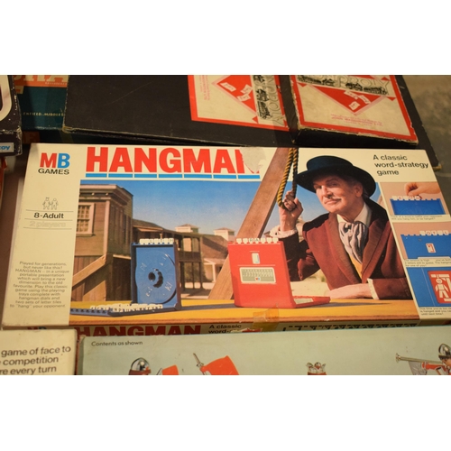 332 - A collection of vintage children's board games and similar to include Kerplunk, Downfall, Hangman, M... 