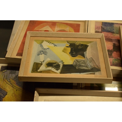 350 - A collection of 20th century framed prints to include famous paintings by artists such as Pablo Pica... 