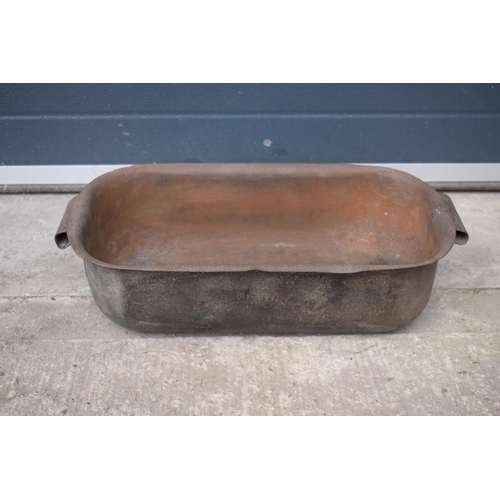 358 - A late 19th century crucible / metal pot / bath. 54 x 27 x 15cm tall.