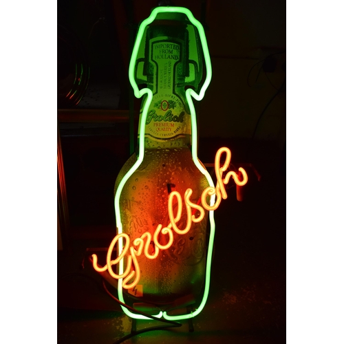 361 - A Grolsch neon light advertising sign. 82cm tall. (No postage due to fragile nature of item. Collect... 