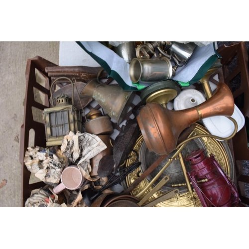 385 - A mixed collection of items to include a traditional lantern, copper jug, tankards, brass ware, meas... 