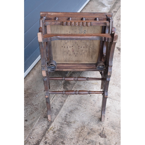 390 - Edwardian wooden spring-action American-style rocking chair with turned decoration. 96cm tall. In go... 