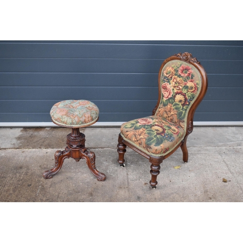 391 - A 19th century walnut carved piano stool with upholstered adjustable seat together with a matching c... 