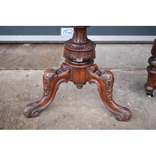 391 - A 19th century walnut carved piano stool with upholstered adjustable seat together with a matching c... 