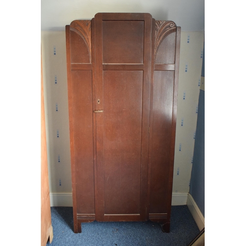 392 - Early to Mid 20th century wooden single wardrobe with carved decoration. 86 x 43 x 187cm tall. In go... 