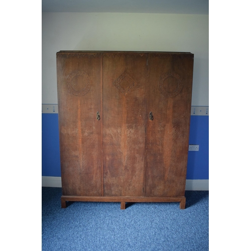 393 - Early 20th century wooden triple wardrobe with decoration to panels. 154 x 48 x 187cm tall. In good ... 