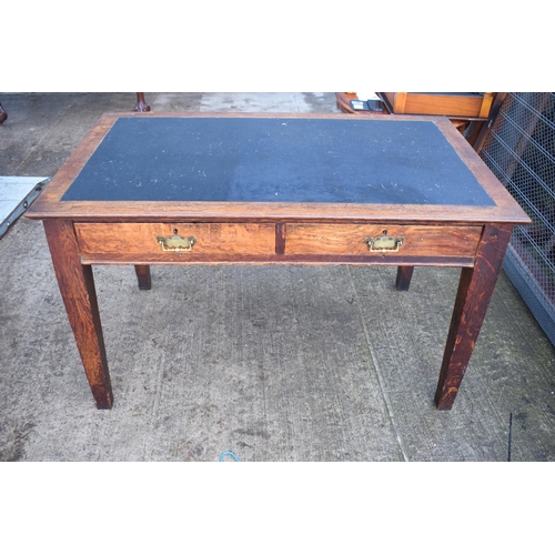 397 - A late 19th / early 20th century wooden desk with a black leather inset with 2 drawers. 123 x 76 x 7... 