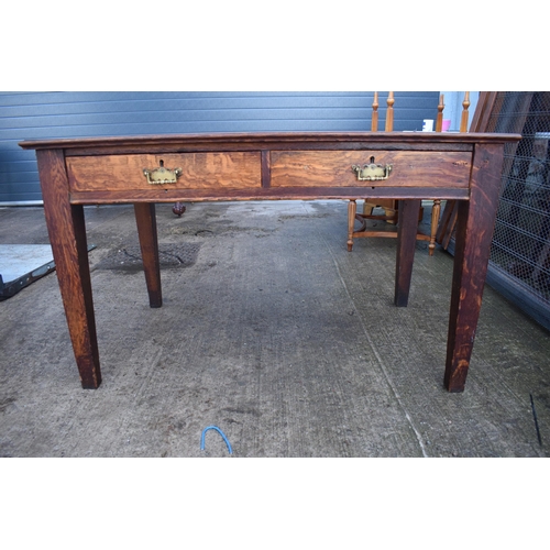 397 - A late 19th / early 20th century wooden desk with a black leather inset with 2 drawers. 123 x 76 x 7... 