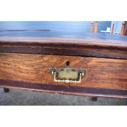 397 - A late 19th / early 20th century wooden desk with a black leather inset with 2 drawers. 123 x 76 x 7... 