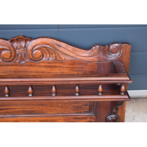 404 - An early 20th century wooden shelving unit / spice shelf with carved decoration and turned features.... 